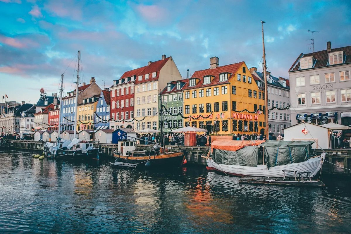 Colorful waterfront buildings and boats in Copenhagen