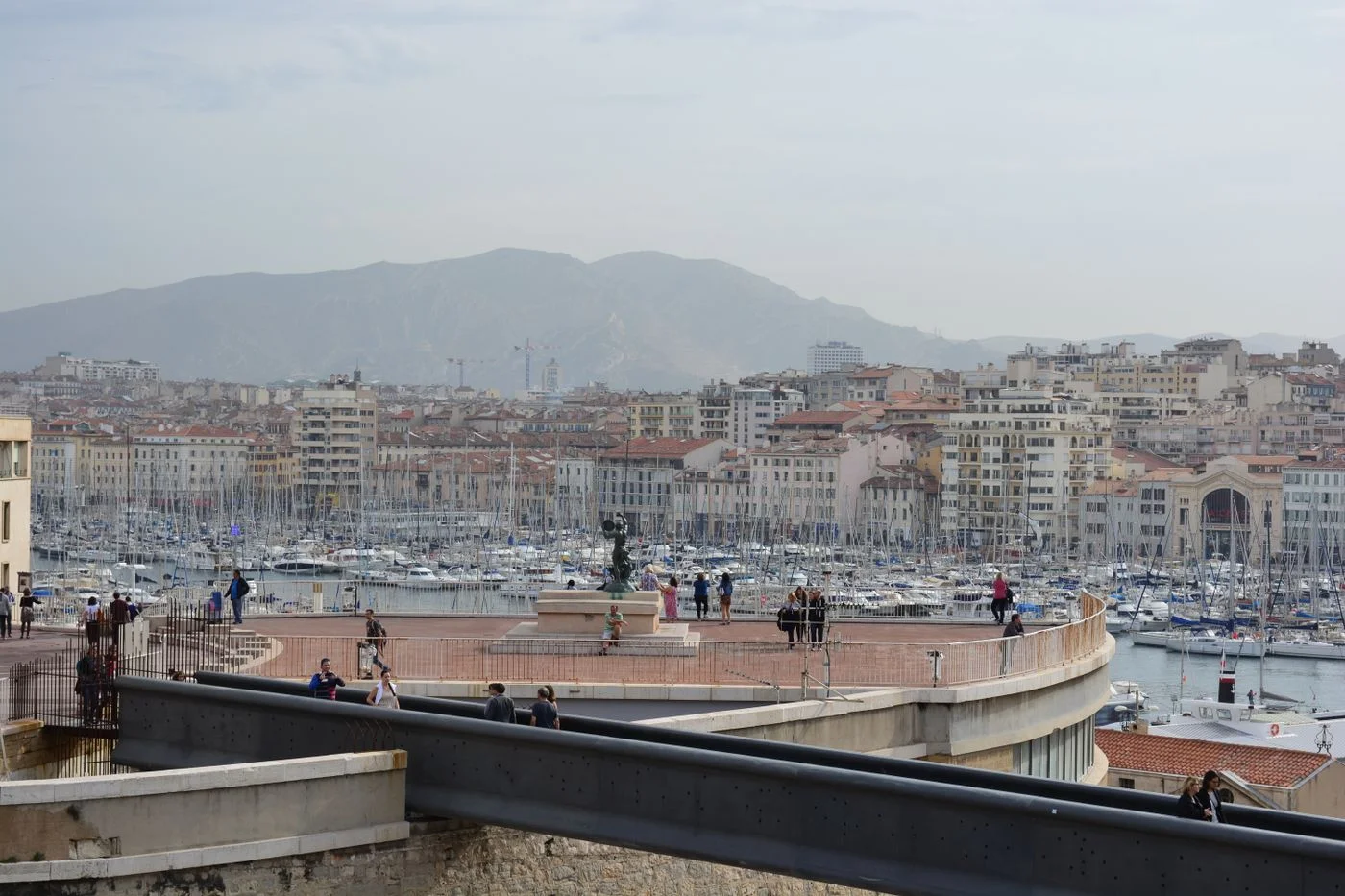 A view across Marseille’s Vieux Port with boats and surrounding buildings.
