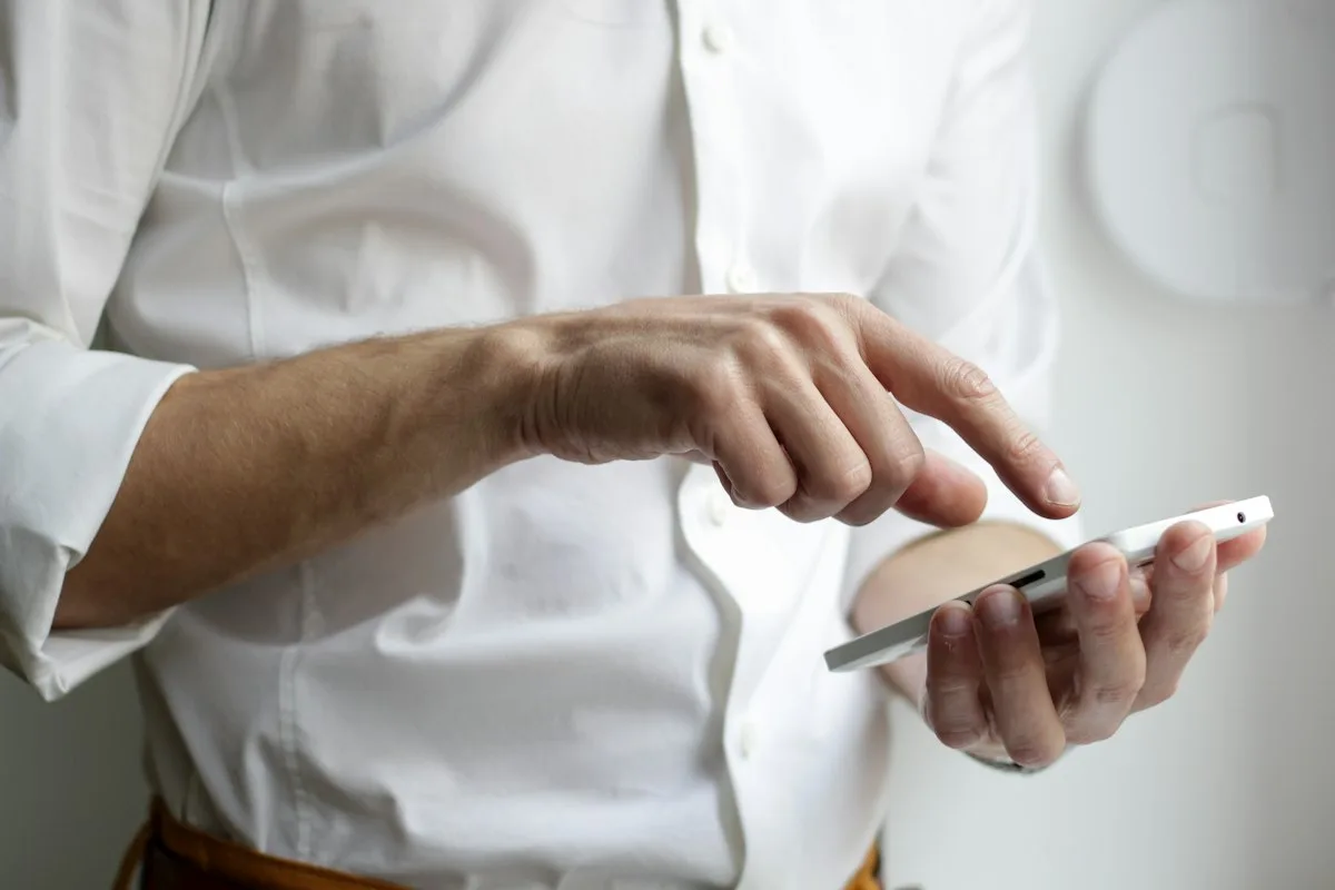 A person checking a smartphone
